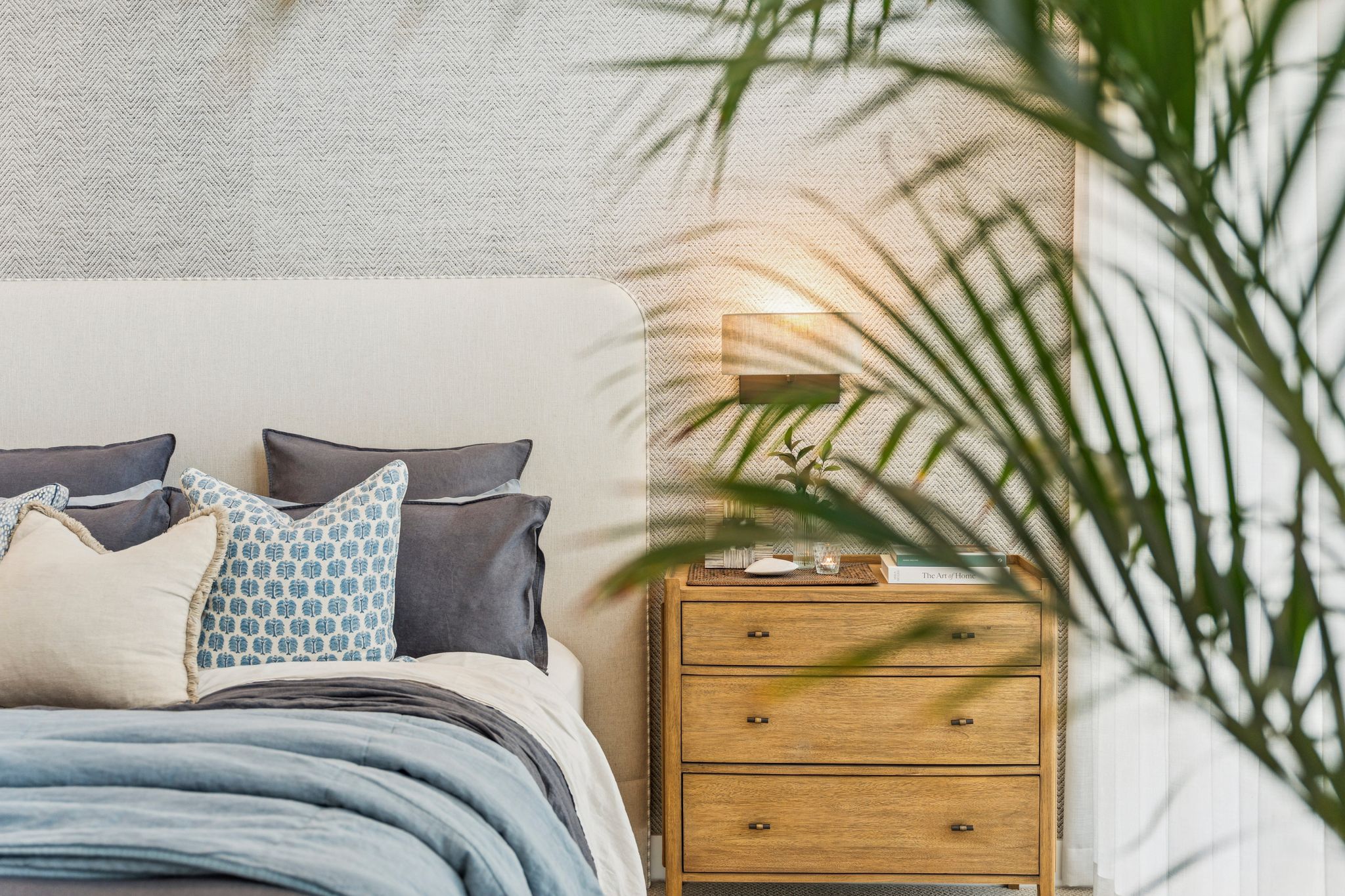A warm, well-maintained bedroom in a managed rental home