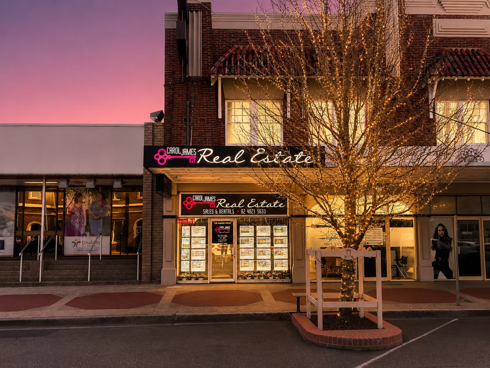 The Carol James Real Estate office on Auburn Street, Goulburn, at dusk