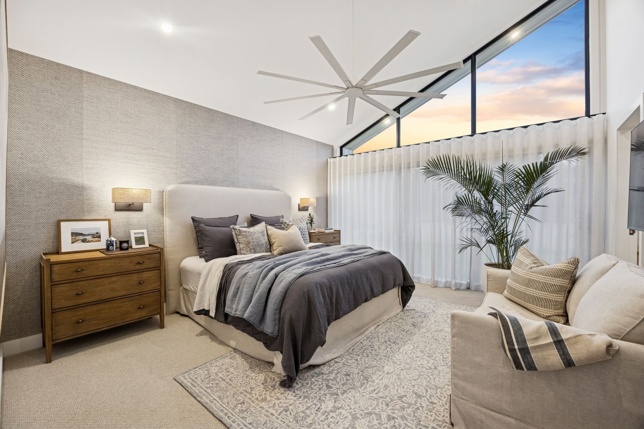 A calm bedroom at dusk in a Goulburn home, styled and photographed for sale