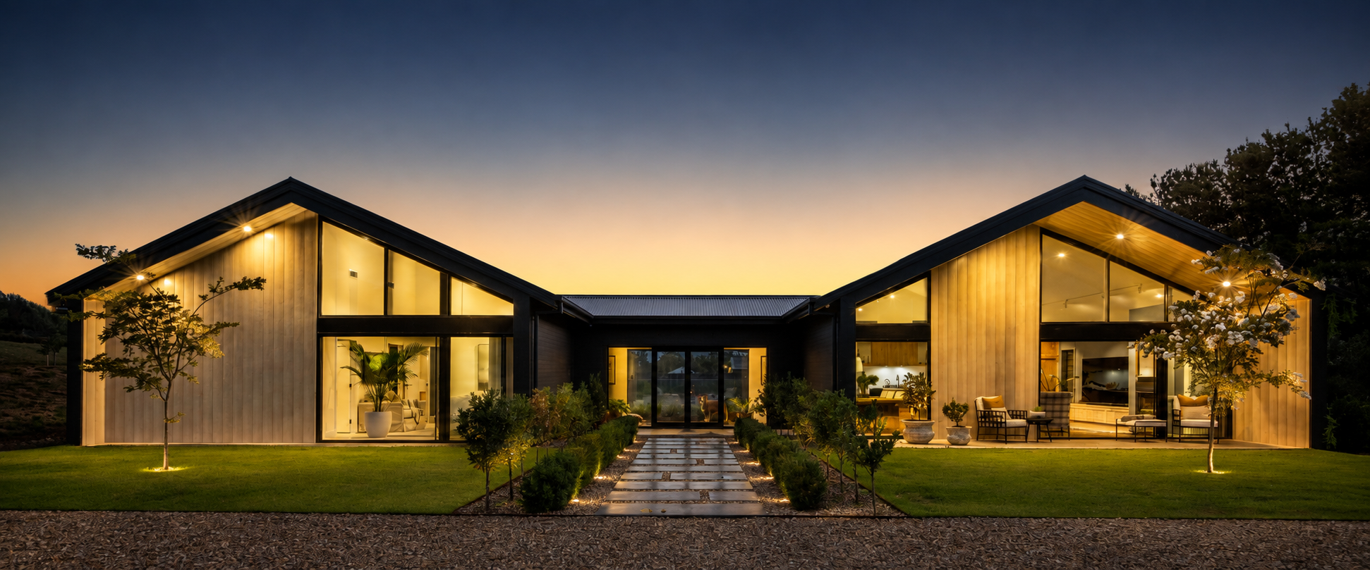 A modern Goulburn home glowing at dusk